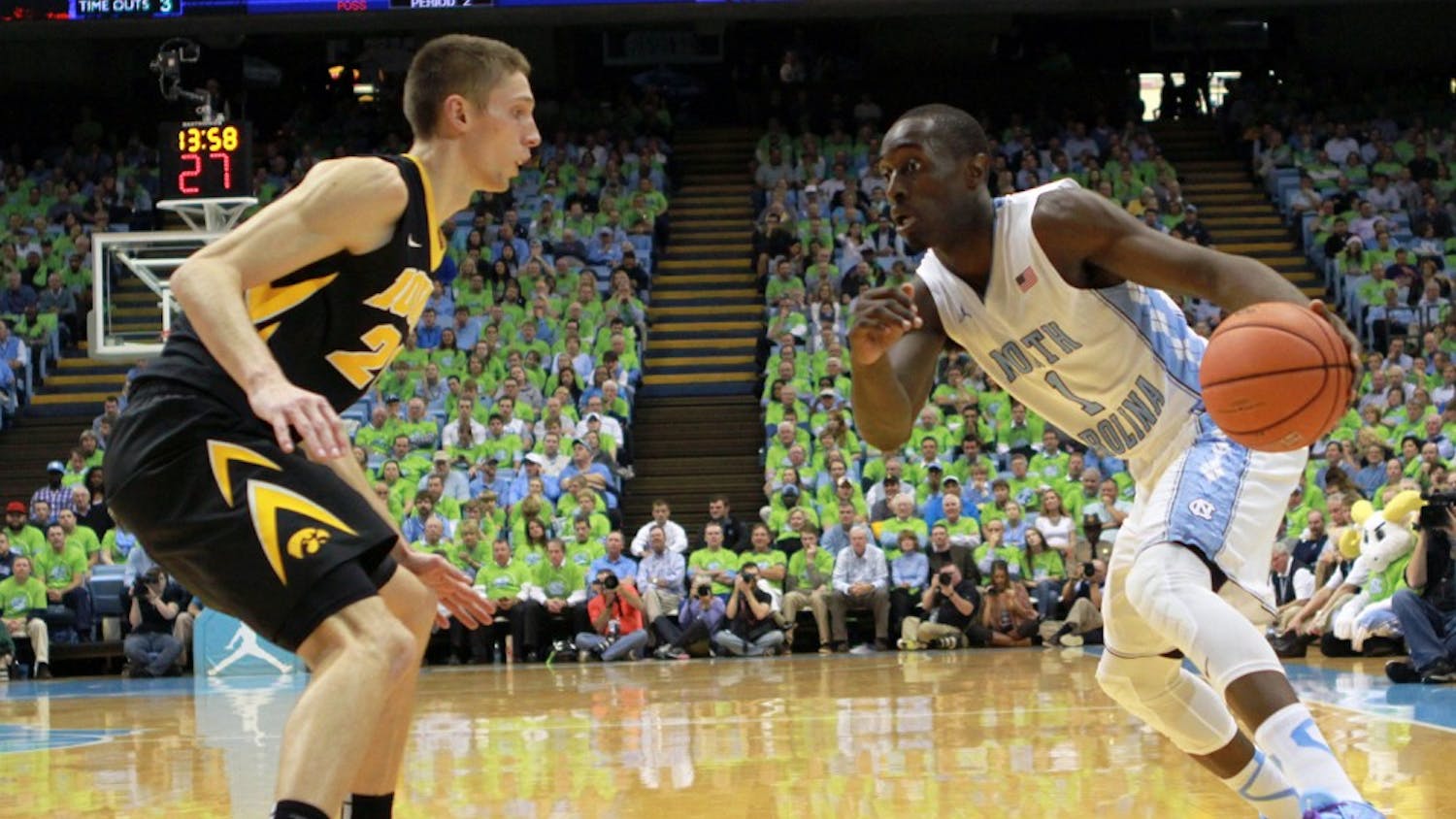 UNC freshman Theo Pinson (1) drives to the basket.