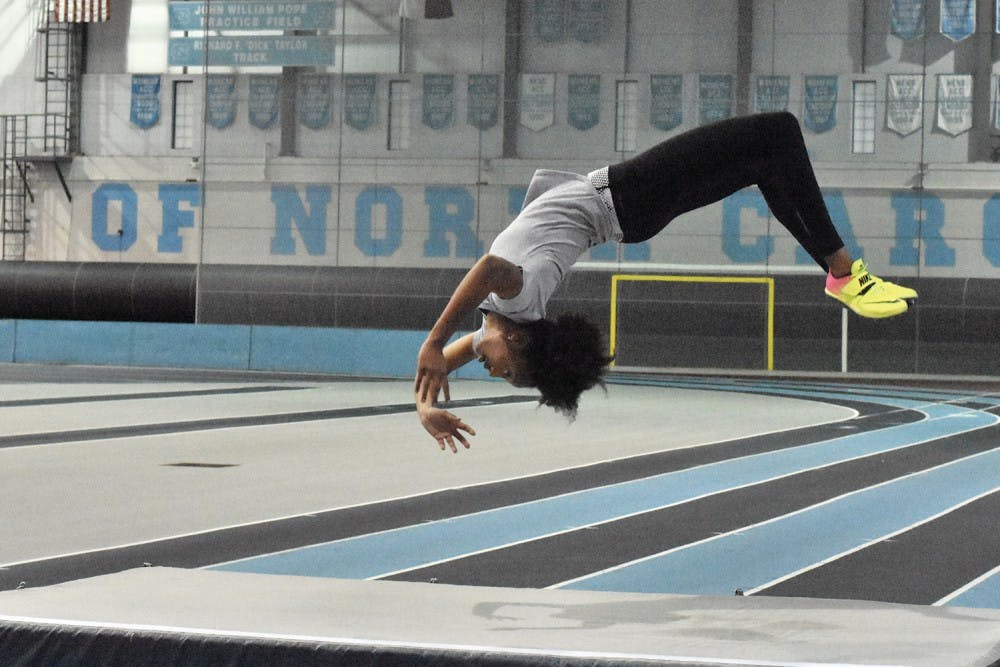 Nicole Greene, a sophomore and two-time NCAA championship-qualifier, practices for the high jump. She has made the Dean’s List each of her three semesters at UNC.