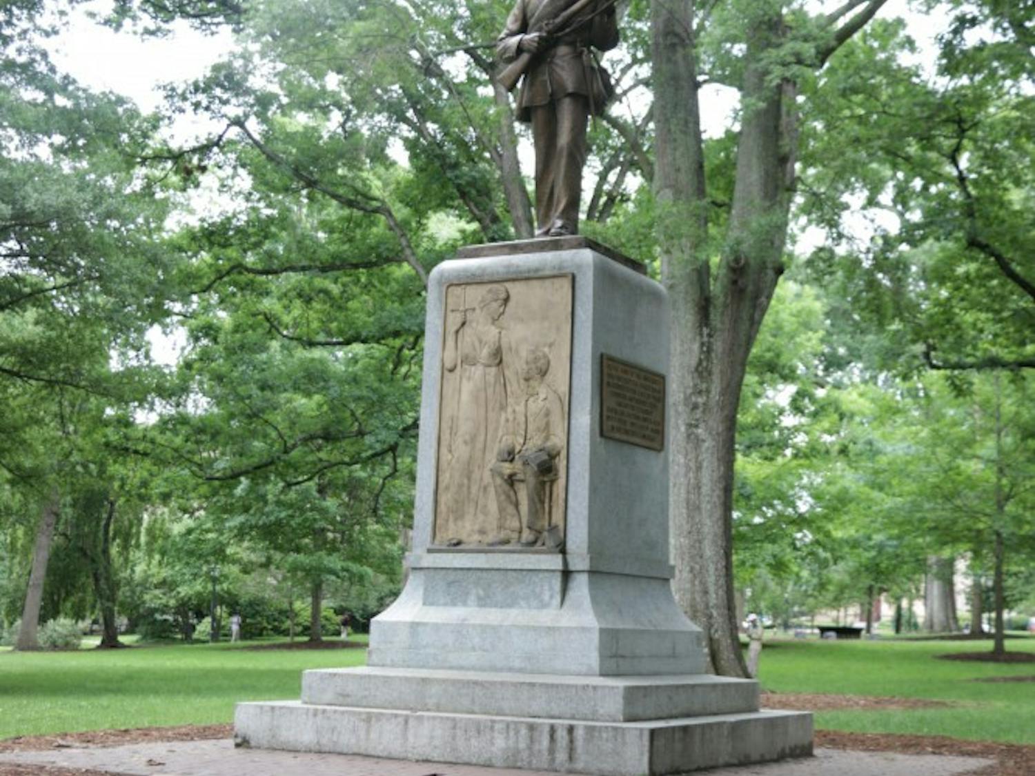 The Silent Sam statue looks towards Franklin Street from its location in the Upper Quad on UNC's campus.