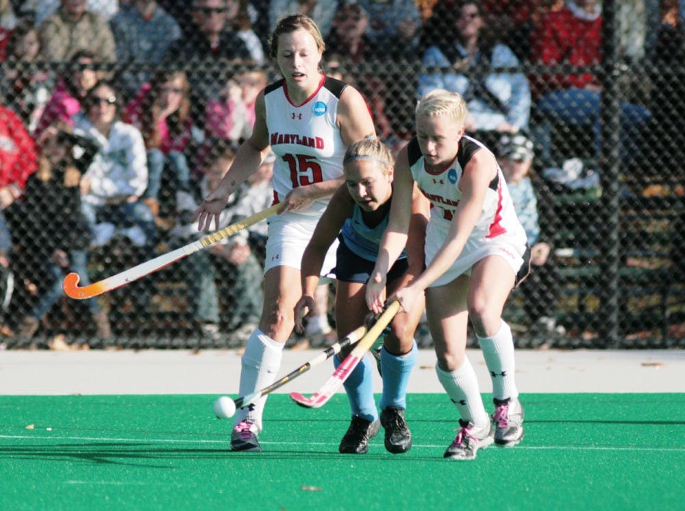 UNC’s Marta Malmberg fights for the ball against the Maryland defense on Sunday. Malmberg scored one of UNC’s two goals in the title game. 