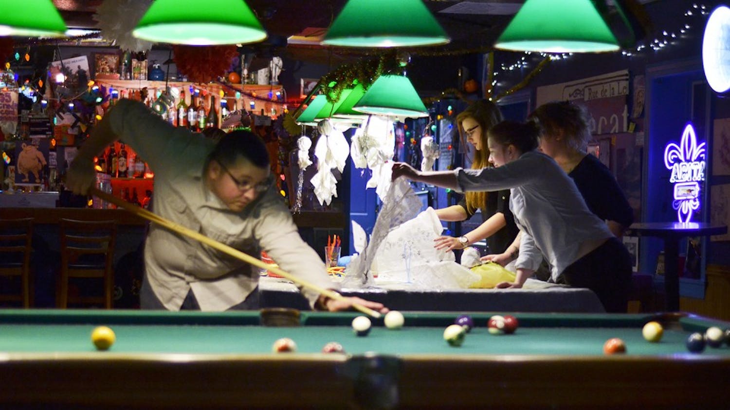 Bars that apply to be "private clubs" do not have to get sanitation inspections. Zog's Art Bar and Pool Hall is a private club on Henderson Street.
