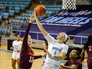 UNC freshman guard Alyssa Utsby (1) does a layup in Carmichael Arena on Jan. 14, 2021 in Chapel Hill, N.C. The Tar Heels lost to the Hokies 66-54.