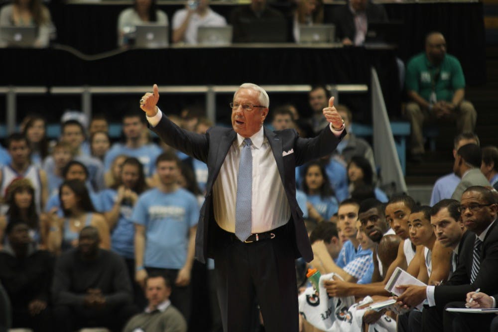 	Coach Roy Williams calls out instructions to his team against ECU.
