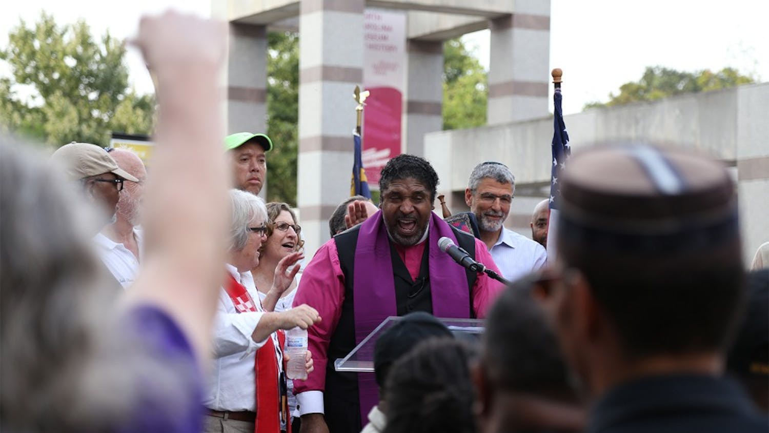 Rev. Dr. William J. Barber II speaks about the history of voters' rights in the U.S. at the rally on Thursday. 

The NAACP lead a march and rally in Raleigh on Thursday as part of "America's Journey for Justice," a 806-mile march from Selma, Alabama, to Washington D.C. Hundreds gathered in the Bicentennial Plaza to protest for voters' rights. 