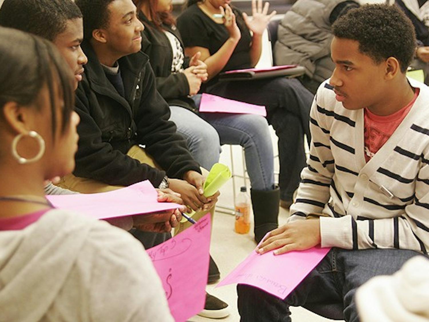 On Monday, a Youth Leadership Program for high school students was held in the Union sponsored by Carolina R.O.C.T.S. This year's theme was "Revitalizing the Dream: The time is always right to do what is right." Cameron Heath (in stripes), a sophomore in high school, talks about values that are important to him with other students. "I've learned that you can share similar community values with other people."