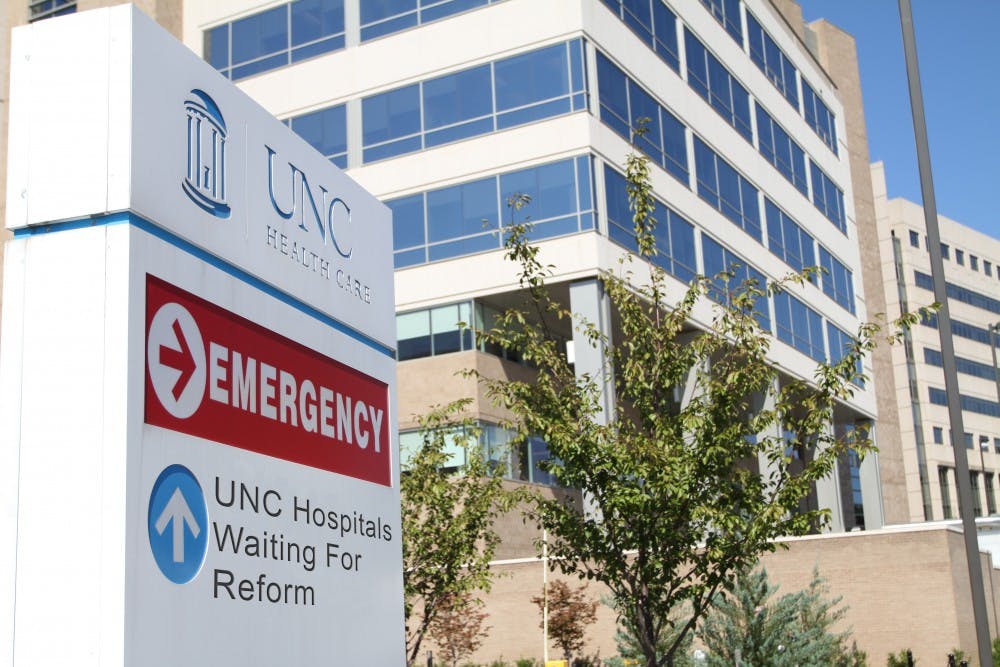 UNC Hospitals, seen here from the corner of Manning Drive and Emergency Room Drive, awaits health care reform to make up for significant monetary losses in recent years.