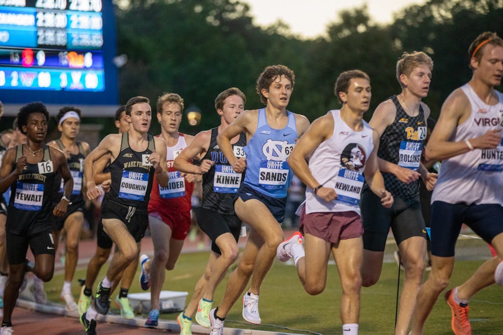 Freshman Colton Sands competes in the 5000M ACC Championship race at Morris Williams Track on Saturday, May 14, 2022. The UNC men's team finished fourth in the meet overall.