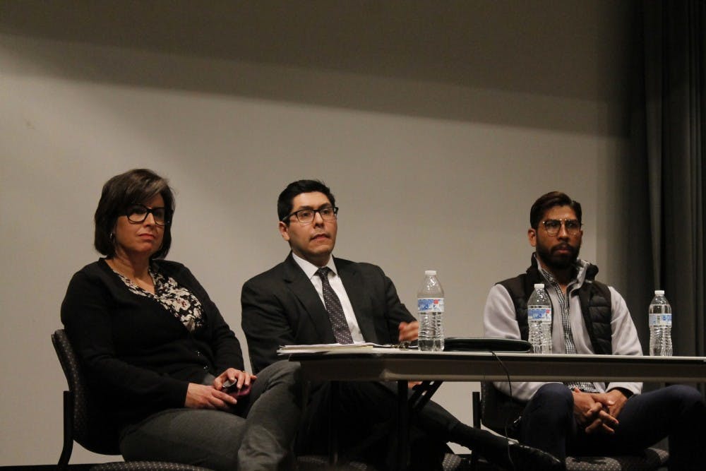 <p>(From left to right) Victoria Romero, Raul Pinto and Ricardo García Lopez conclude the Immigration Overview Panel and Teach-In by answering questions of attendees of the event at the UNC School of Social Work on Monday, Feb. 18, 2019.&nbsp;</p>