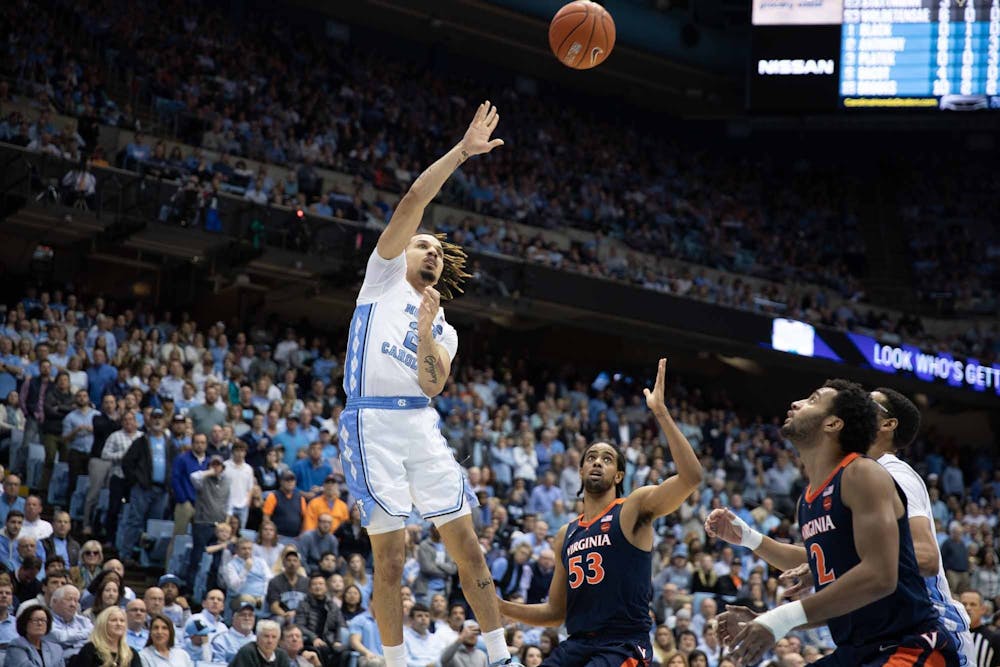 First-year guard Cole Anthony (2) attempts a basket against Virginia in the Smith Center on Saturday, Feb. 15, 2020. 