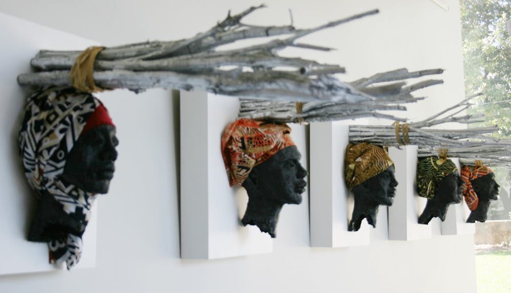 From October 20-December 17, 2011 the FedEx Global Education Center will host a sculptural exhibition of works by Mitch Lewis in order to bring greater awareness towards Darfur and American Activism. According to Lewis, the exhibition will 