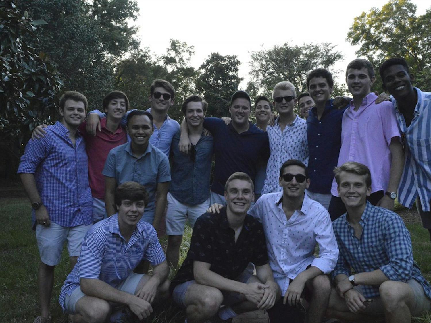 UNC's Clef Hangers hid behind the Tri Delta house, waiting for their moment to sing to the girls during their celebration.