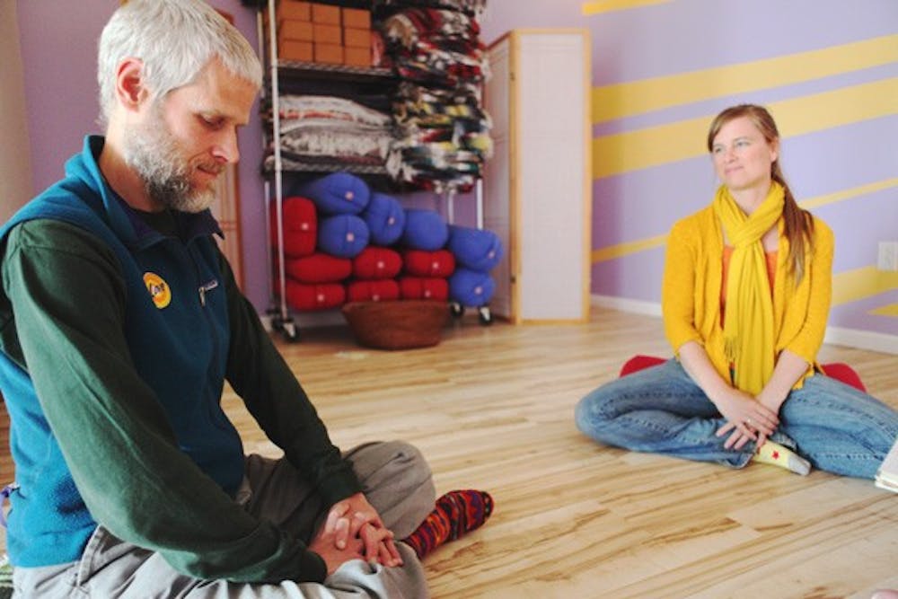Yoga teachers Ti Harmony and Allison Dennis at the Open Heart Yoga School in Carrboro, which they founded. DTH/Stephen Mitchell