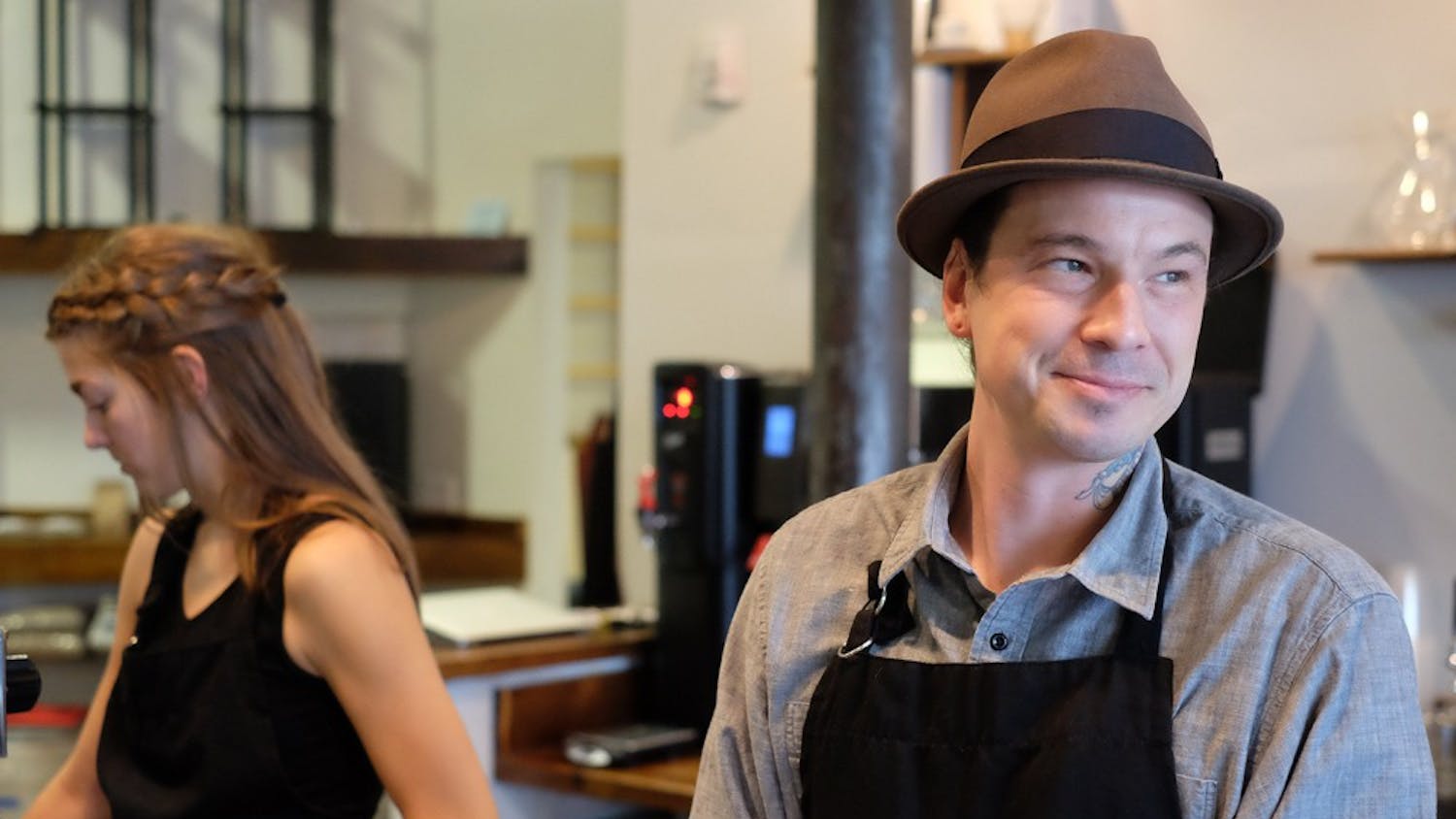 Shaw Sturton works alongside Laura Leech at Grey Squirrel, a new coffee show in Carrboro.