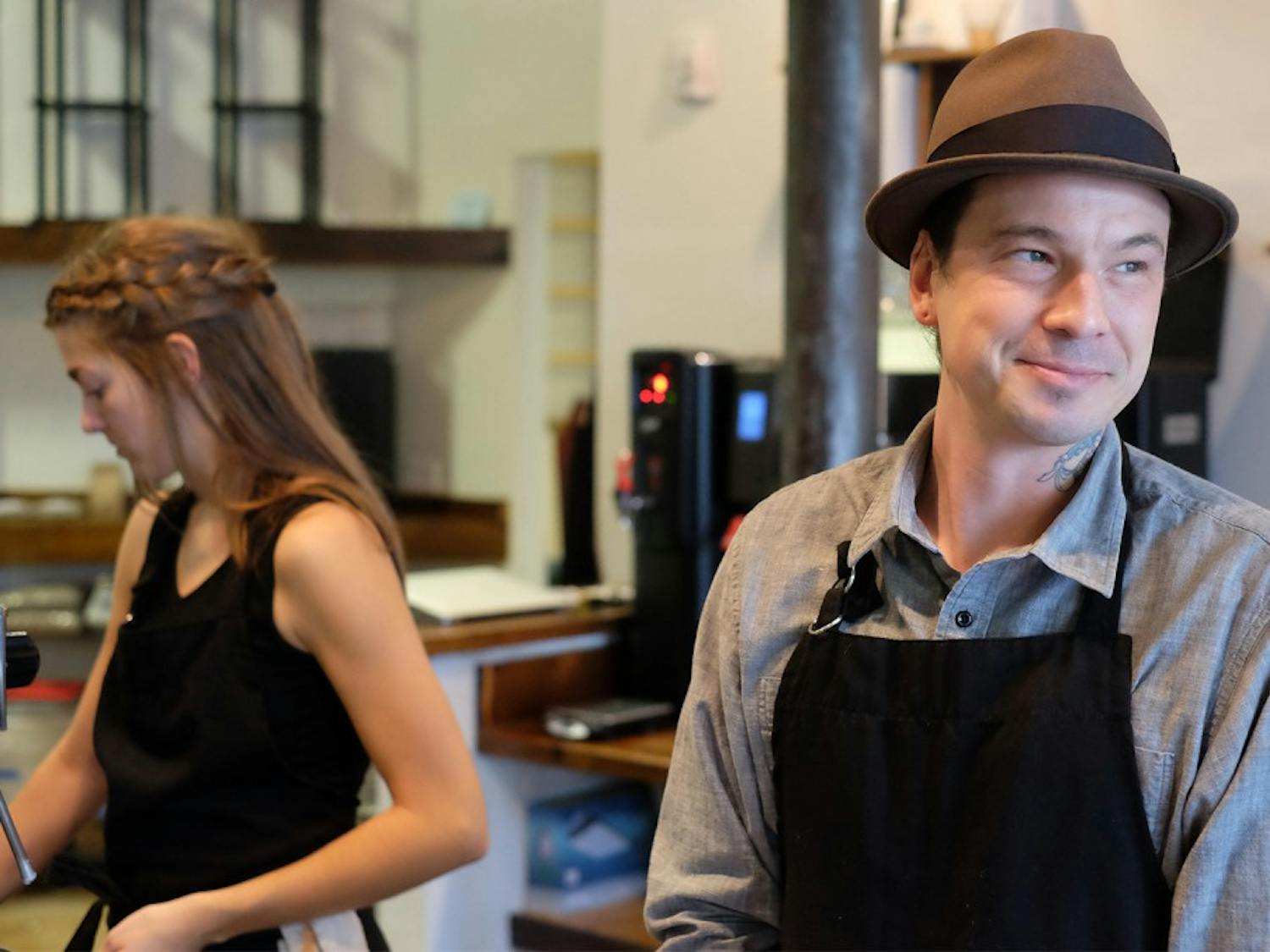 Shaw Sturton works alongside Laura Leech at Grey Squirrel, a new coffee show in Carrboro.