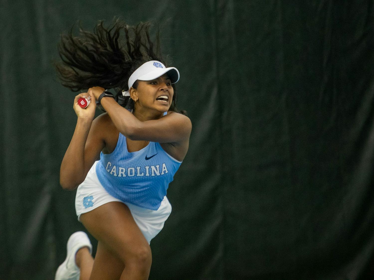 UNC first-year Anika Yarlagadda returns a volley during her singles match against the University of Michigan at the Cone-Kenfield Tennis Center in Chapel Hill, N.C., on Feb. 1, 2020. Yarlagadda went on to win her match giving the Tar Heels the last point needed to secure a 4-0 victory against Michigan.