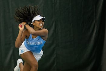 UNC first-year Anika Yarlagadda returns a volley during her singles match against the University of Michigan at the Cone-Kenfield Tennis Center in Chapel Hill, N.C., on Feb. 1, 2020. Yarlagadda went on to win her match giving the Tar Heels the last point needed to secure a 4-0 victory against Michigan.