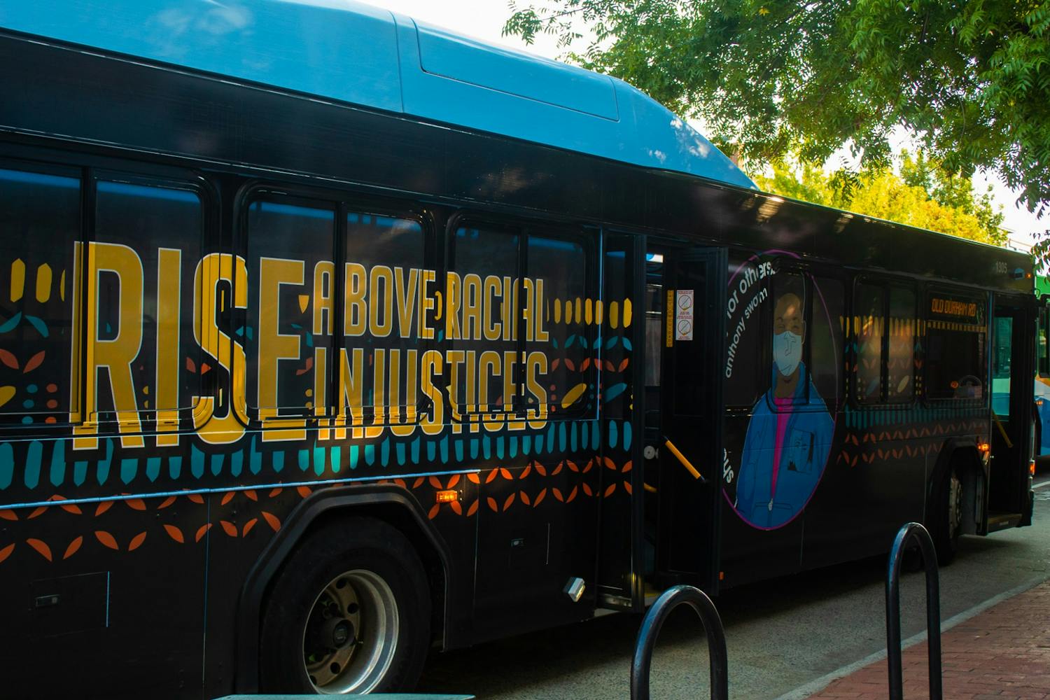 The new art bus, highlighting the the ongoing struggle for racial justice, stopped on Franklin Street for a break between stops.jpg