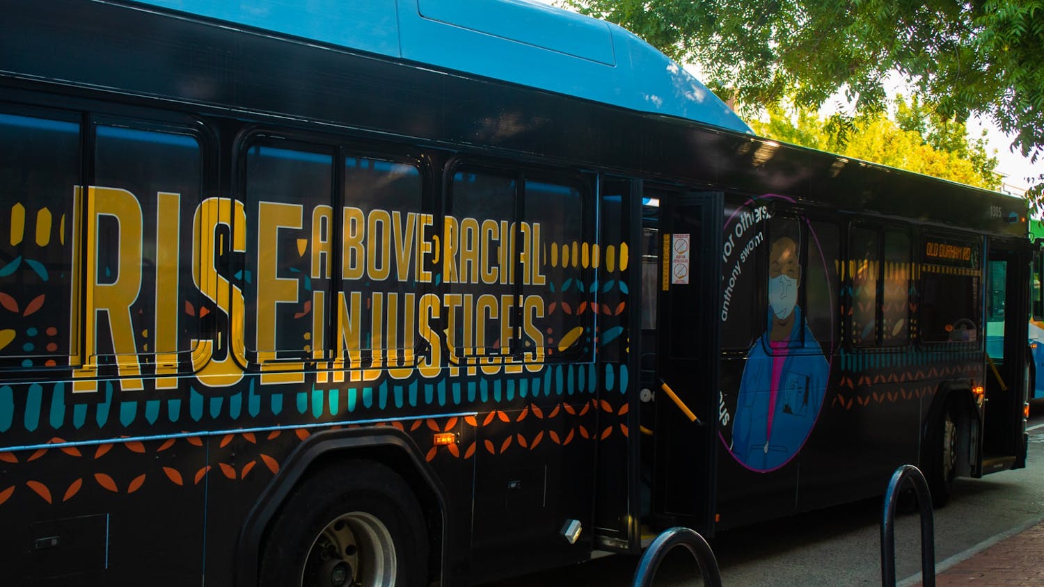 The new art bus, highlighting the the ongoing struggle for racial justice, stopped on Franklin Street for a break between stops.jpg