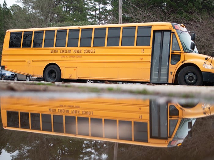 A North Carolina school bus located in Carrboro, N.C. on Wednesday, Feb. 12, 2020. On Feb. 6, 2020, local schools dismissed early in order to get students home in the midst of severe  weather. The storms  coincided with dismissals, however, causing students and staff to return indoors.