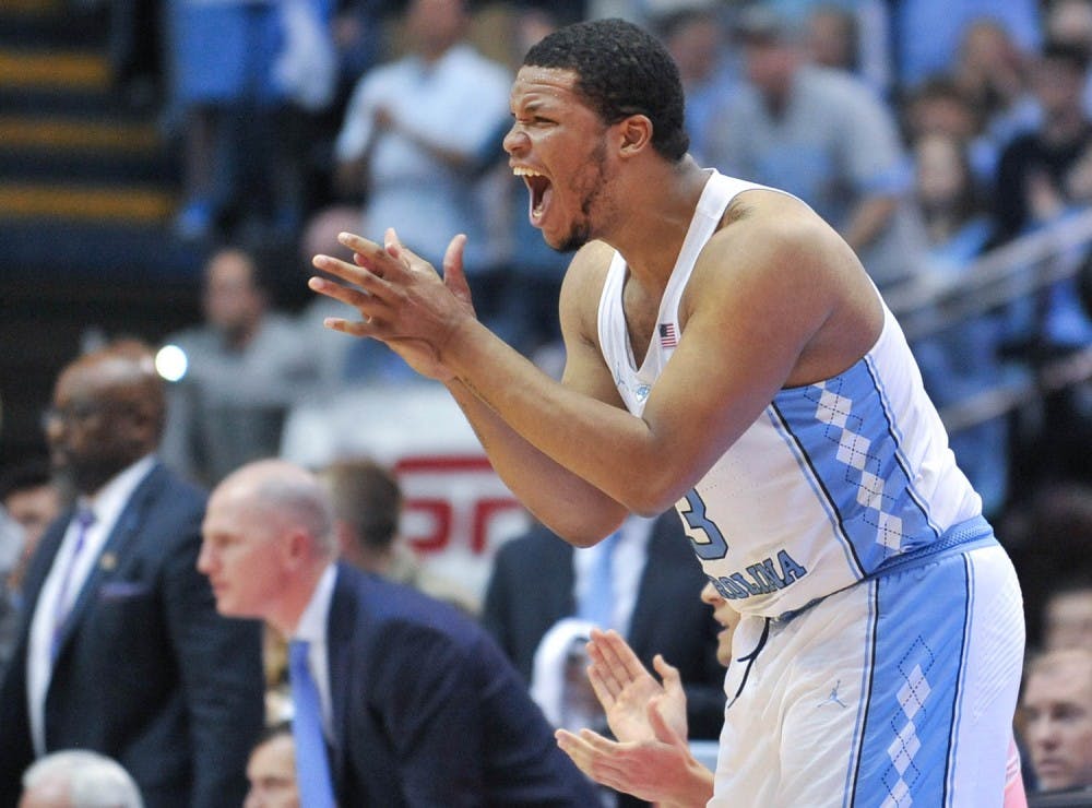 Senior Kennedy Meeks (3) cheers on the team from the sidelines.&nbsp;