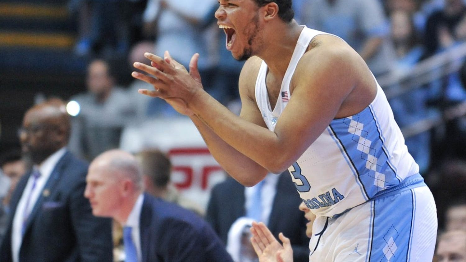 Senior Kennedy Meeks (3) cheers on the team from the sidelines.&nbsp;