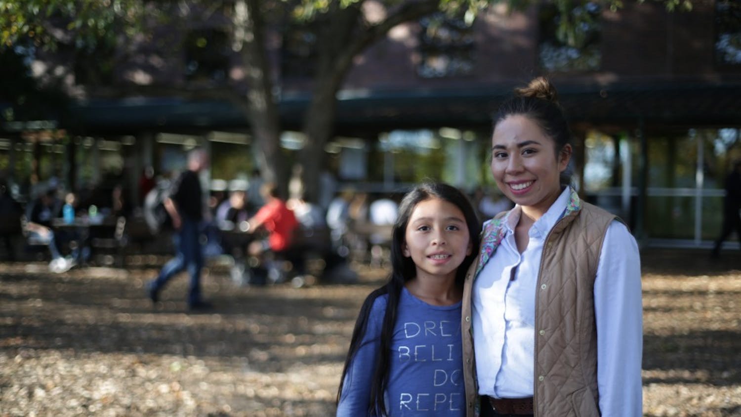 Johanna &amp; Cynthia Salazar pose for a portrait outside of Weaver Street Market in Carrboro.&nbsp;