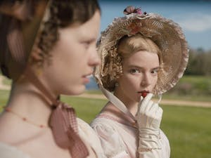Anya Taylor-Joy, right, dons a joy-inducing bonnet in Autumn de Wilde's upcoming film "Emma," based on the Jane Austen novel. Photo courtesy of Box Hill Films/Focus Features.