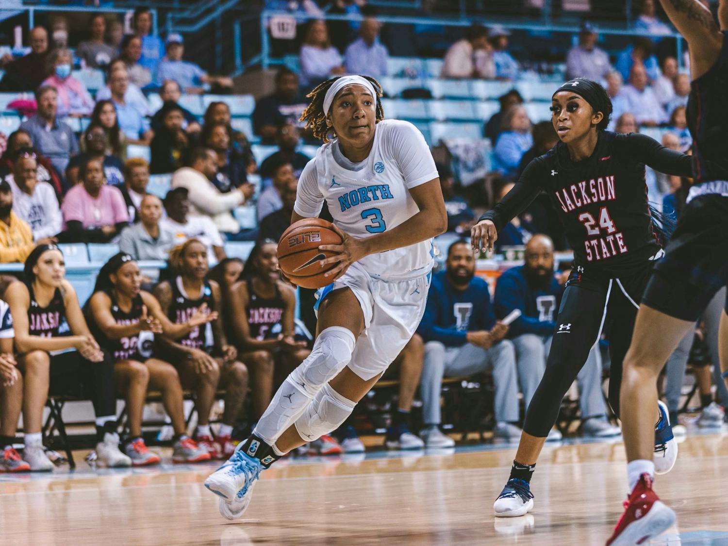 UNC junior guard Kennedy Todd-Williams (3) drives in near the end of the second quarter of the women's basketball game against Jackson State University in Carmichael Arena.