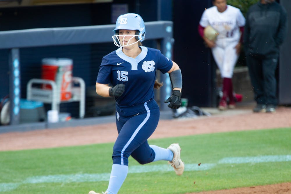 UNC senior catcher Taylor Greene (15) runs towards home plate during a home game against N.C. Central at Anderson Stadium on Wednesday, Apr. 20, 2022.
