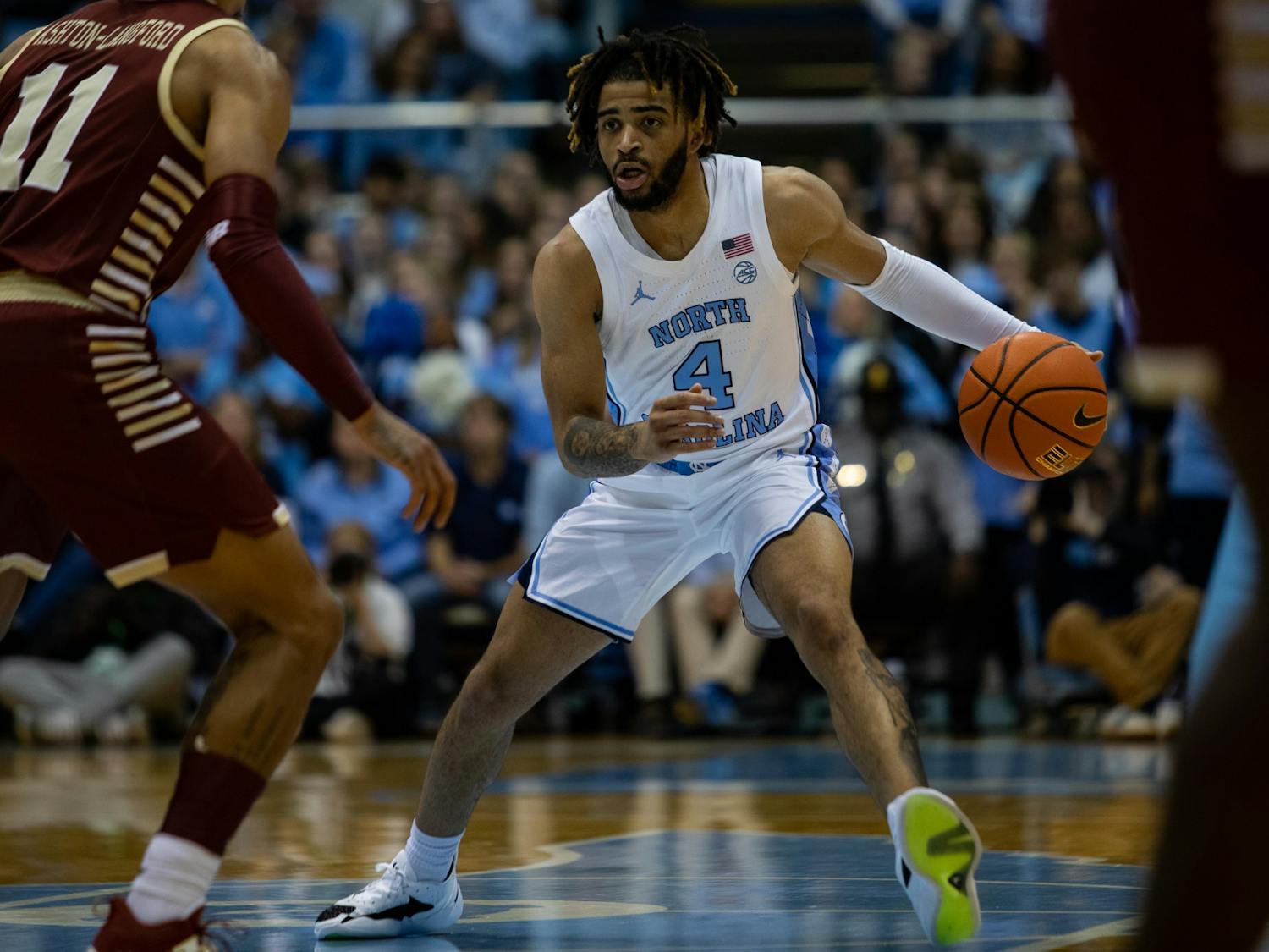 UNC junior guard RJ Davis (4) dribbles the ball during the men's basketball game against Boston College on Tuesday, Jan. 17, 2022, at the Dean Smith Center. UNC beat Boston College 72-64.