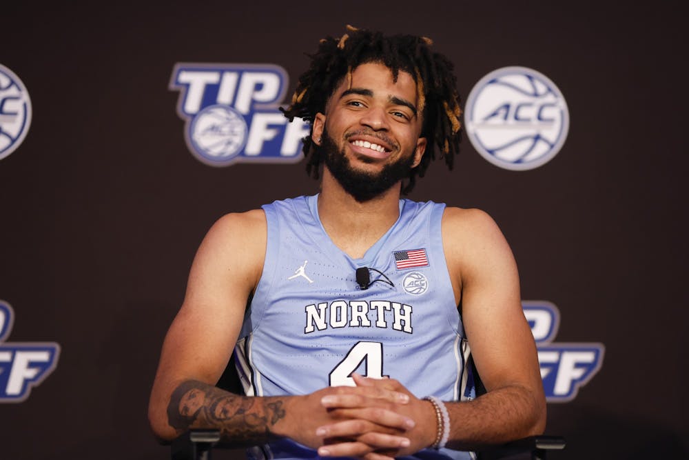 North Carolina basketball player RJ Davis answers a question at the 2022 ACC Tipoff in Charlotte, N.C., Wednesday, Oct. 12, 2022. (Photo by Nell Redmond/ACC)