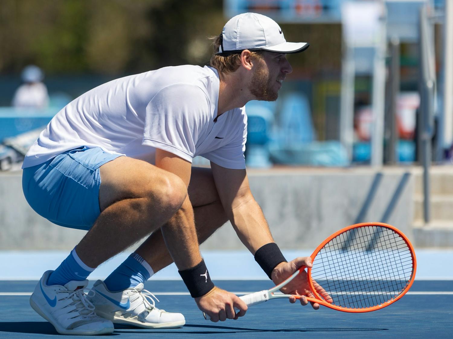 UNC graduate student Ryan Seggerman waits for doubles partner, Casey Kania, to serve during the mens’ tennis match against Wake Forrest at the newly opened Cone-Kenfield Tennis Center in Chapel Hill on Sunday, April 2, 2023. UNC beat Wake Forest 4-3.