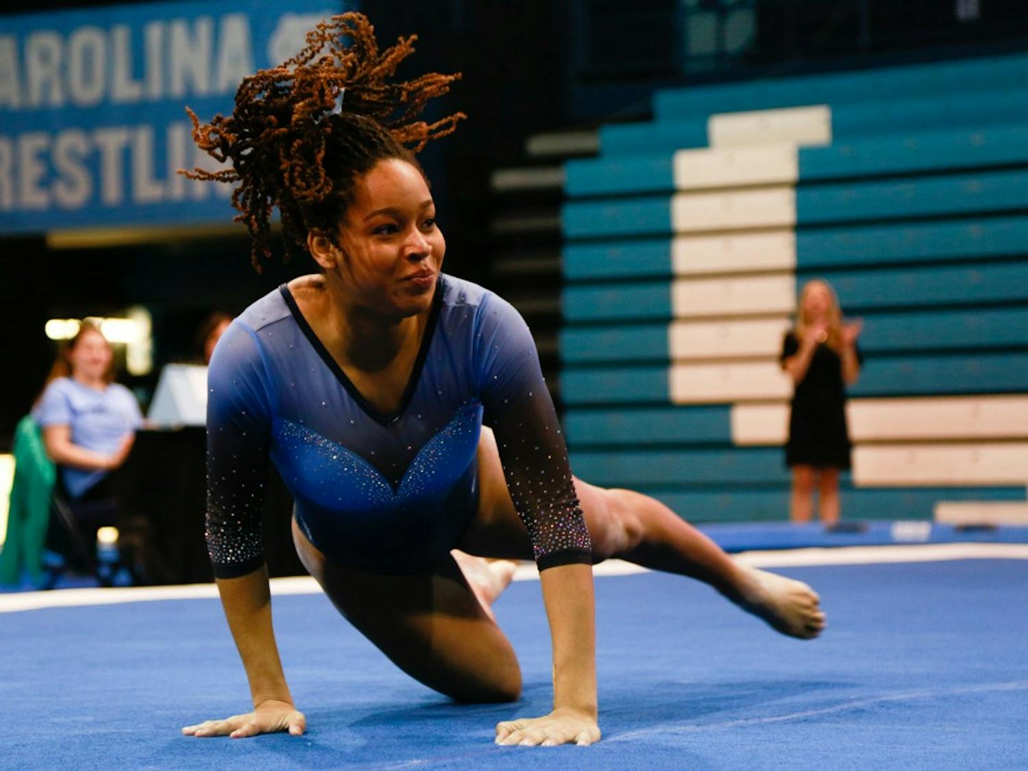 Junior Mikayla Robinson performs her floor routine at the women's gymnastic meet against Towson University on Saturday, Feb. 9, 2019 in Carmicheal Arena.