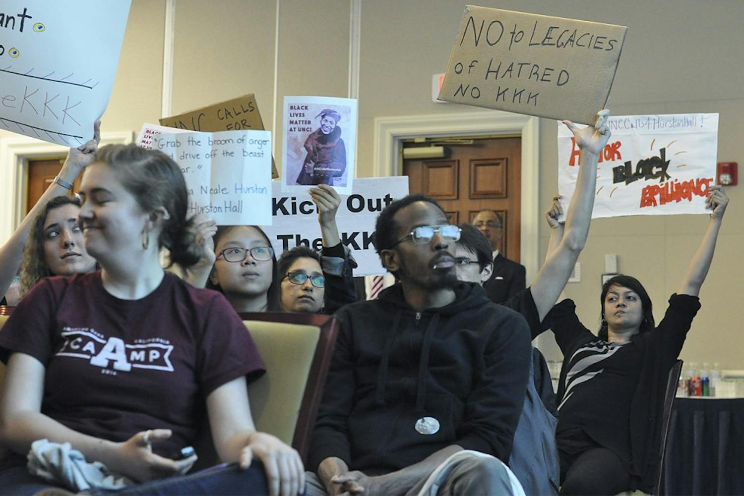 Students from the Real Silent Sam Coalition attended the UNC Board of Trustees' meeting to discuss renaming the academic building Saunders Hall. 