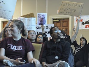 Students from the Real Silent Sam Coalition attended the UNC Board of Trustees' meeting to discuss renaming the academic building Saunders Hall. 