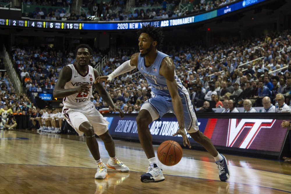 Sophomore guard Leaky Black (1) dribbles during the first-round game of the ACC tournament against Virginia Tech in the Greensboro Coliseum Complex on Tuesday, March 10, 2020. UNC beat Virginia Tech 78-56.
