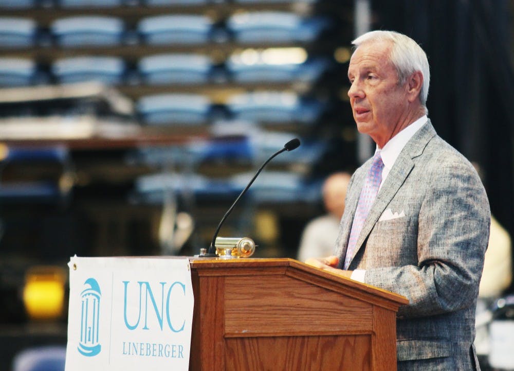 Roy Williams speaks at the Fast Break Against Cancer, an annual breakfast that raises funds for the UNC Lineberger Comprehensive Cancer Center.  

Roy Williams: "You think I'm a tough guy, well I was a daggone pansy before my surgery; I was scared to death.  If there is anyone who has complete confidence in our doctors at the Lineberger Center, it's Roy Williams."

George Karl: "It is so important that you take care of your own community, and UNC is so lucky to have a center as great as this one right at its back door."