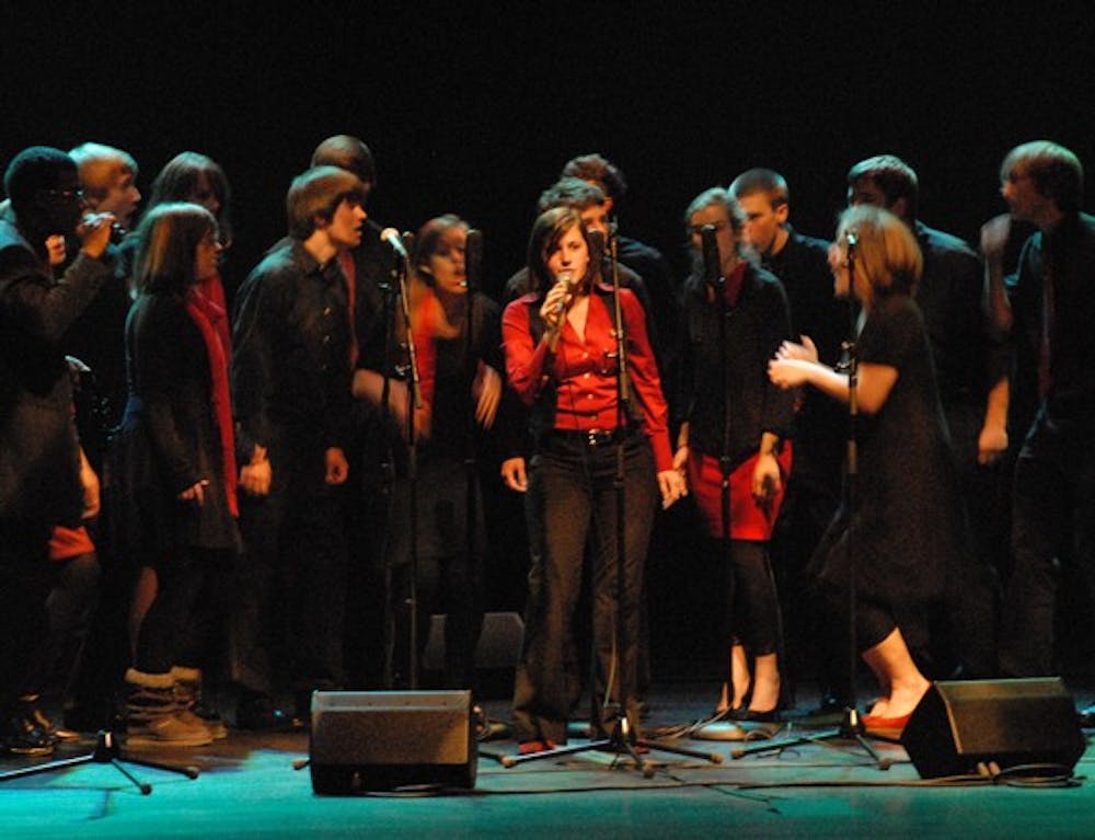 The Psalm 100 a cappella group performs during “1 Voice 4 Haiti.” DTH/Helen Woolard