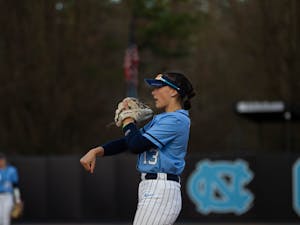UNC first-year catcher and infielder Isabela Emerling (13) warms up before the game against North Carolina Central University on Feb. 21, 2023.