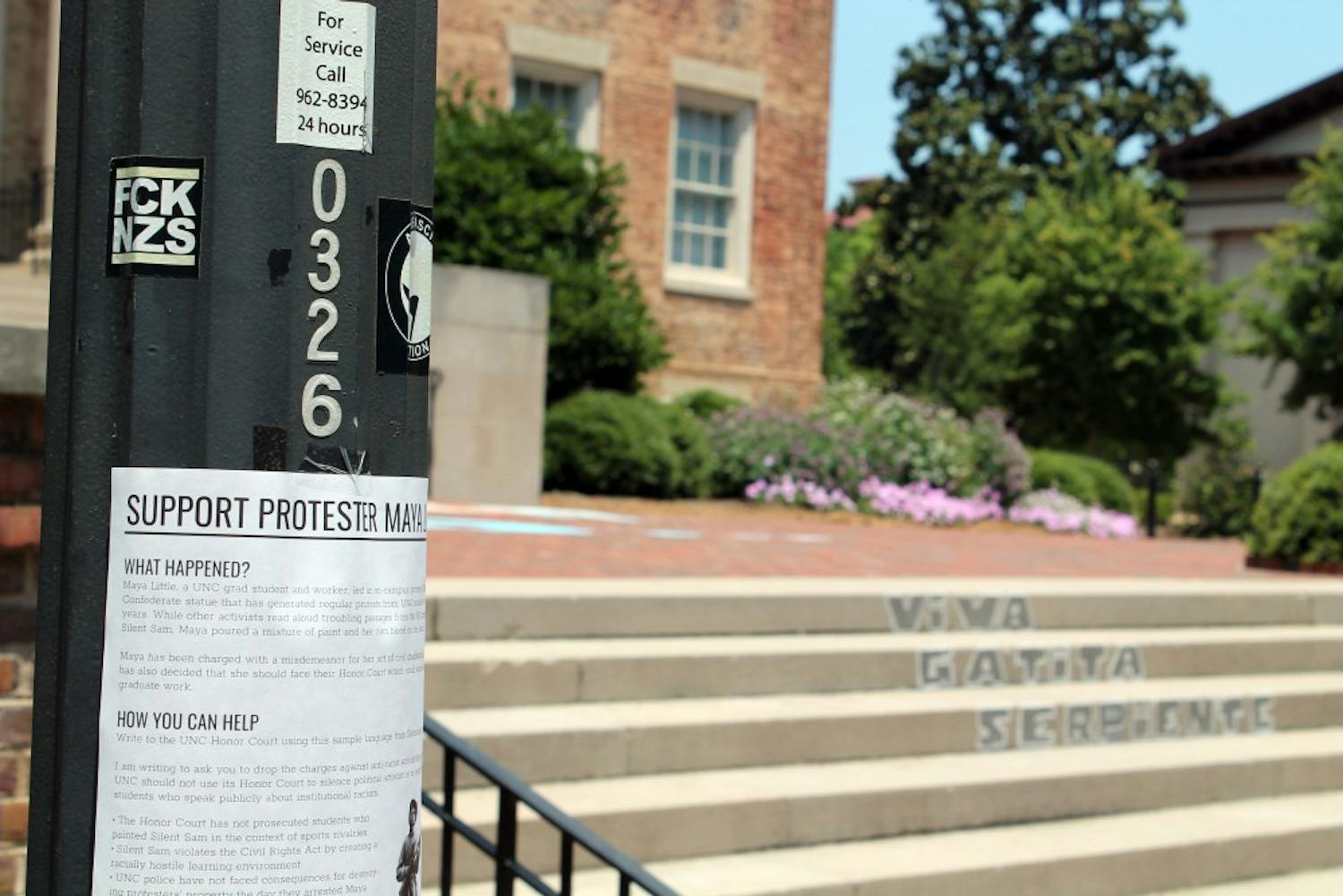 On July 11, protestors chalked "We Have Receipts" and "McCracken Lied" on the bricks in front of South Building. Additionally, "Viva Gatito Serpiente" was chalked onto the stairs, near flyers in support of Silent Sam protestor Maya Little. 