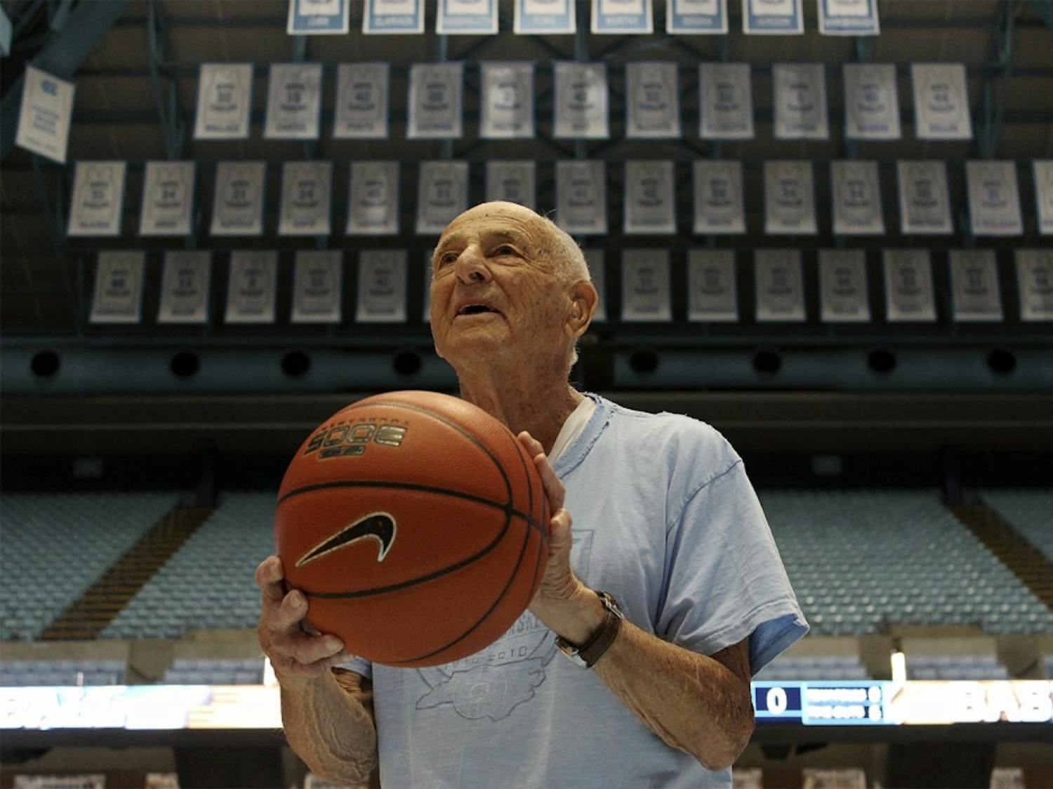 Bob Gersten, the oldest living Tar Heel basketball player, lines up on the paint in the Smith Center.