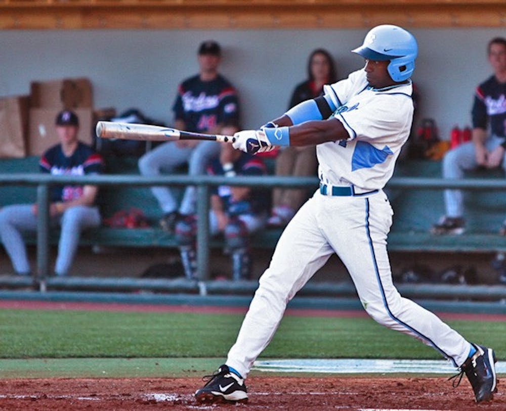 Brian Goodwin gets a hit in the Tar Heels 17-6 win over Richmond Tuesday. DTH/Phong Dinh