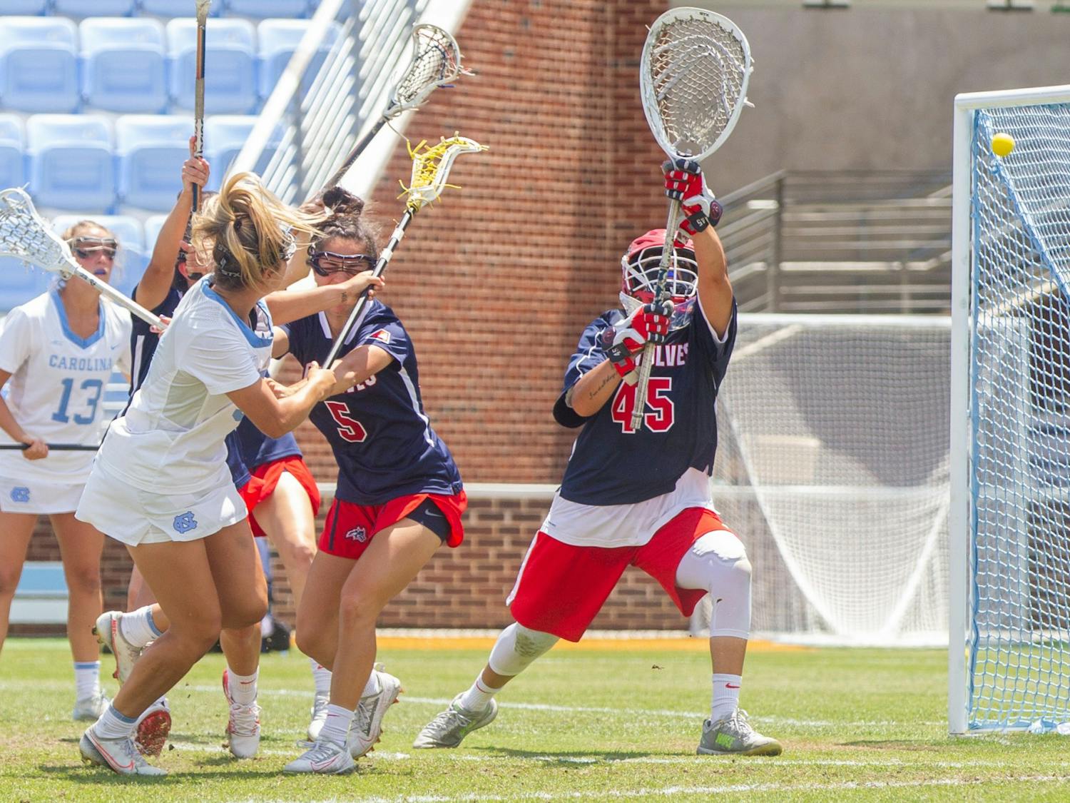 UNC senior attacker Jamie Ortega (3) scores a goal at the quarterfinals of the NCAA tournament against Stony Brook at the Dorrance Field in Chapel Hill on Saturday May 22, 2021. The Tar Heels won 14-11.