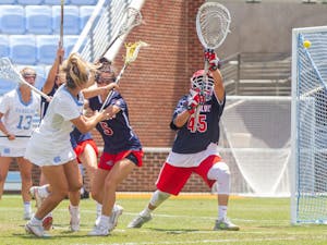 UNC senior attacker Jamie Ortega (3) scores a goal at the quarterfinals of the NCAA tournament against Stony Brook at the Dorrance Field in Chapel Hill on Saturday May 22, 2021. The Tar Heels won 14-11.