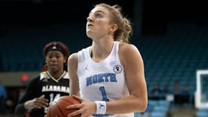 Sophomore guard Alyssa Ustby (1) prepares to shoot the ball at the game against Alabama State on Dec 21, 2021 at Carmichael Arena. UNC won 83-47.