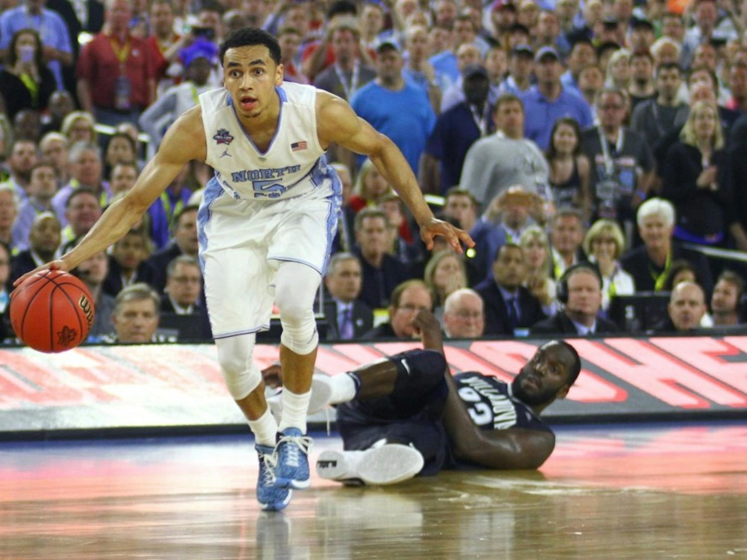 Former North Carolina guard Marcus Paige dribbles in the 2016 national championship game.