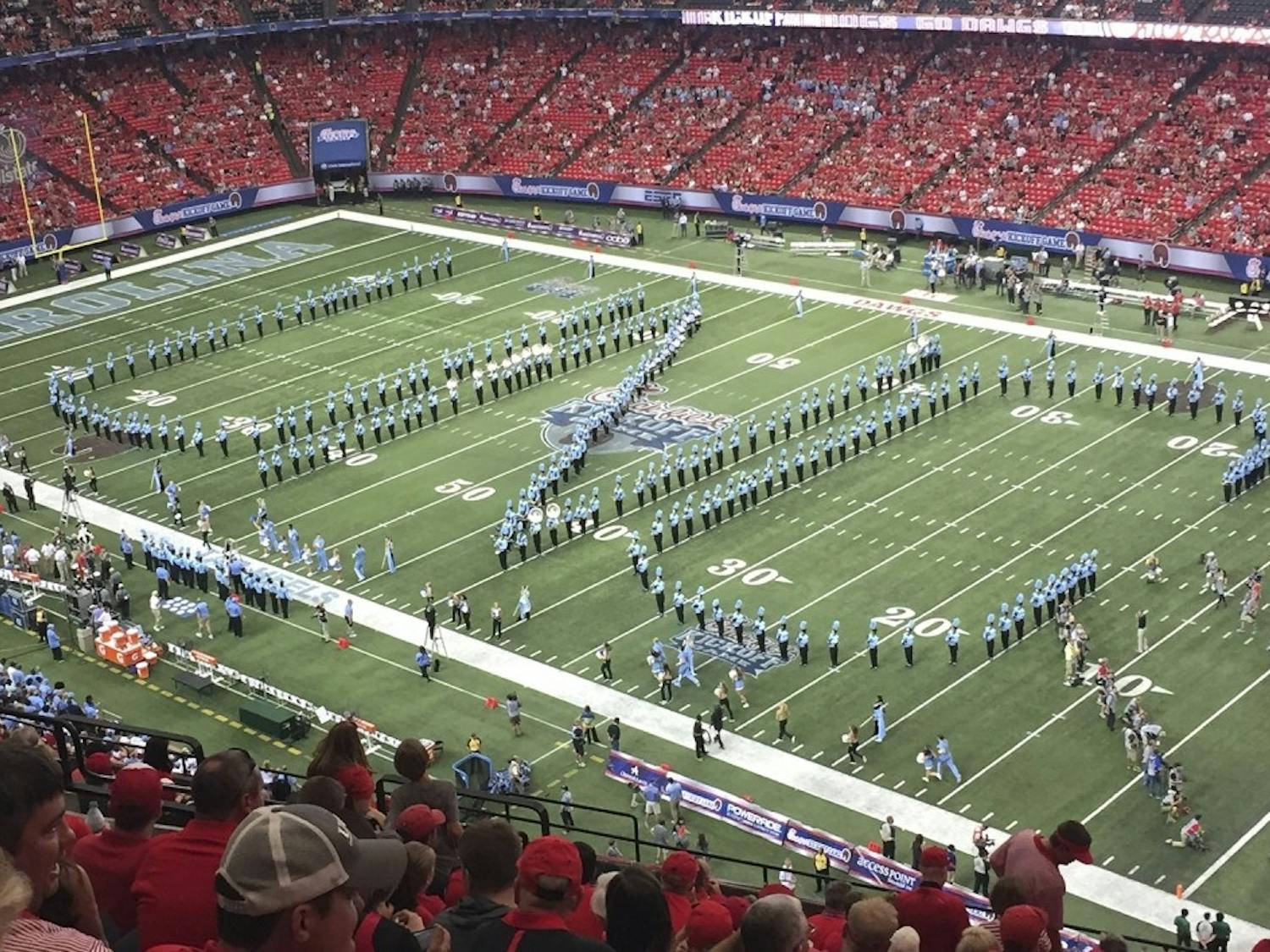 The UNC marching band, The Marching Tar Heels, performs at the Chick-fil-A kickoff game against Georgia in Atlanta on Sep. 3. Photo Courtesy of Kristie Thompson.

