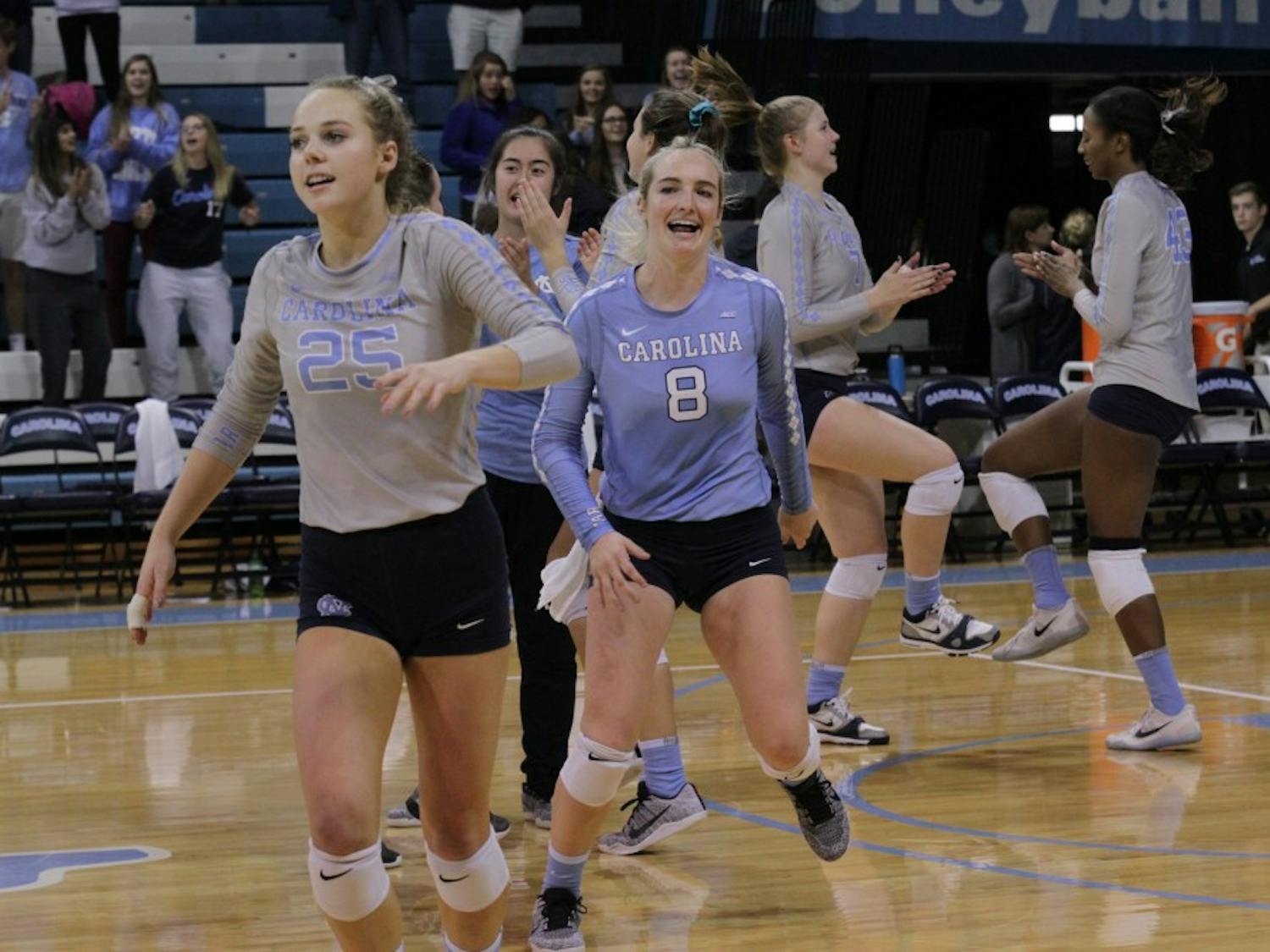 Members of the UNC volleyball team celebrate after their 3-2 win over Georgia Tech on Thursday evening.