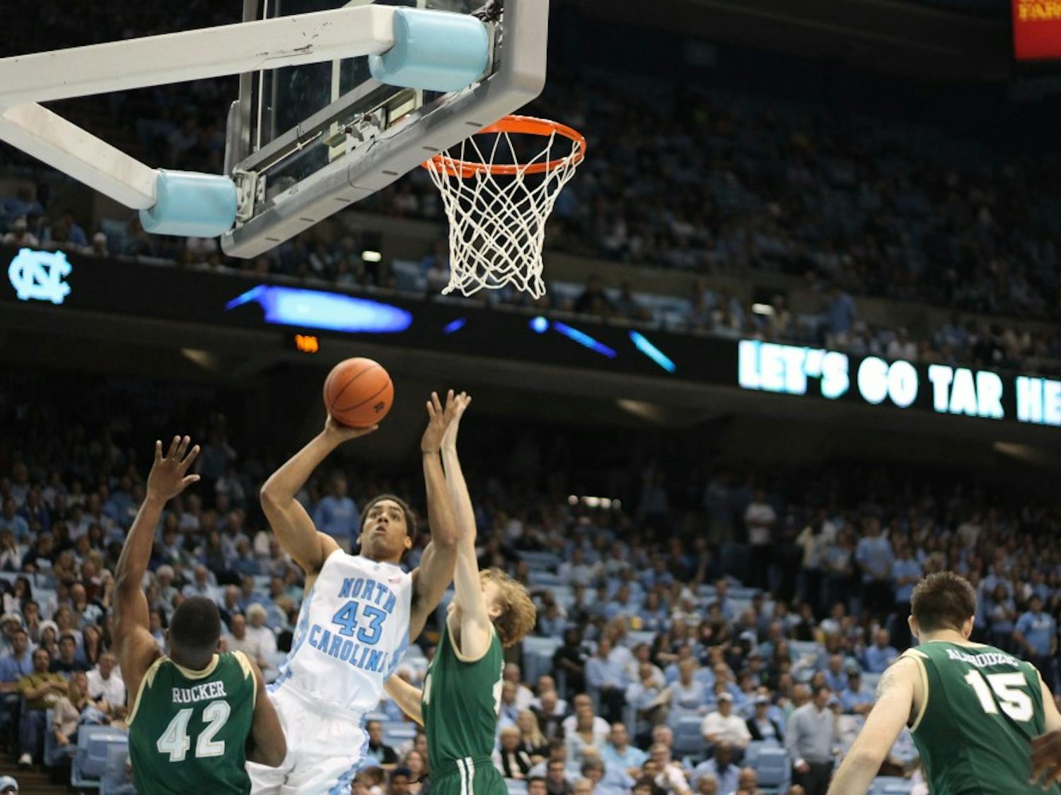 	James McAdoo goes up for a shot at the UNC men&#8217;s basketball game Friday night against UAB.  UNC won 102-84.
