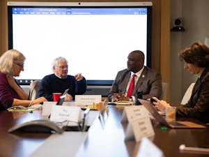 (From left) Faculty Governance University Program Specialist Helena Knego, Chairperson Lloyd Kramer, UNC Police Chief David Perry and Joy Renner convene in South Building for a Faculty Executive Committee meeting to discuss campus safety measures in the wake of Perry's appointment as chief on Monday, Nov. 4, 2019. Perry emphasizes a need for the police to build a rapport with the community.